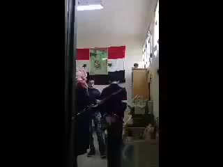 syrian teacher whipping students